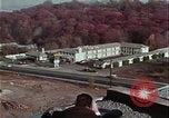 Image of criminals arrested motel stakeout United States USA, 1964, second 16 stock footage video 65675078749