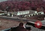 Image of criminals arrested motel stakeout United States USA, 1964, second 17 stock footage video 65675078749