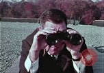 Image of criminals arrested motel stakeout United States USA, 1964, second 23 stock footage video 65675078749