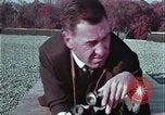 Image of criminals arrested motel stakeout United States USA, 1964, second 24 stock footage video 65675078749