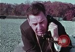 Image of criminals arrested motel stakeout United States USA, 1964, second 26 stock footage video 65675078749