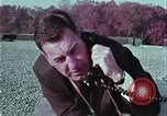 Image of criminals arrested motel stakeout United States USA, 1964, second 27 stock footage video 65675078749