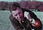 Image of criminals arrested motel stakeout United States USA, 1964, second 28 stock footage video 65675078749