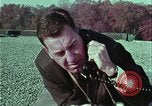 Image of criminals arrested motel stakeout United States USA, 1964, second 30 stock footage video 65675078749