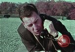 Image of criminals arrested motel stakeout United States USA, 1964, second 31 stock footage video 65675078749