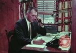 Image of criminals arrested motel stakeout United States USA, 1964, second 32 stock footage video 65675078749
