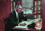 Image of criminals arrested motel stakeout United States USA, 1964, second 38 stock footage video 65675078749