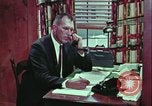 Image of criminals arrested motel stakeout United States USA, 1964, second 39 stock footage video 65675078749