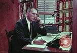 Image of criminals arrested motel stakeout United States USA, 1964, second 40 stock footage video 65675078749