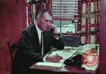 Image of criminals arrested motel stakeout United States USA, 1964, second 42 stock footage video 65675078749