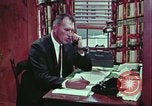 Image of criminals arrested motel stakeout United States USA, 1964, second 44 stock footage video 65675078749