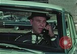 Image of criminals arrested motel stakeout United States USA, 1964, second 46 stock footage video 65675078749