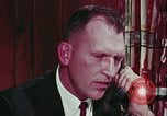 Image of criminals arrested motel stakeout United States USA, 1964, second 53 stock footage video 65675078749