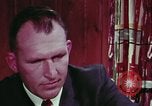 Image of criminals arrested motel stakeout United States USA, 1964, second 55 stock footage video 65675078749