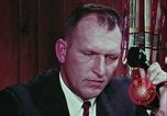 Image of criminals arrested motel stakeout United States USA, 1964, second 60 stock footage video 65675078749