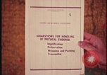 Standbild FBI-Labornachweis-Paket geöffnet United States USA, 1970, aus Sekunde 43 historischem Filmmaterial Videoclip 65675078751