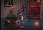 Image of detective gather crime evidence United States USA, 1970, second 1 stock footage video 65675078755