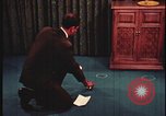 Image of detective gather crime evidence United States USA, 1970, second 3 stock footage video 65675078755