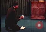 Image of detective gather crime evidence United States USA, 1970, second 5 stock footage video 65675078755