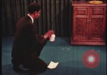 Image of detective gather crime evidence United States USA, 1970, second 6 stock footage video 65675078755