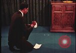 Image of detective gather crime evidence United States USA, 1970, second 11 stock footage video 65675078755