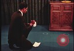Image of detective gather crime evidence United States USA, 1970, second 12 stock footage video 65675078755