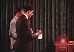 Image of detective gather crime evidence United States USA, 1970, second 17 stock footage video 65675078755