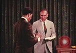 Image of detective gather crime evidence United States USA, 1970, second 18 stock footage video 65675078755