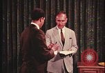 Image of detective gather crime evidence United States USA, 1970, second 19 stock footage video 65675078755