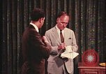 Image of detective gather crime evidence United States USA, 1970, second 22 stock footage video 65675078755