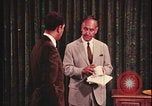 Image of detective gather crime evidence United States USA, 1970, second 23 stock footage video 65675078755