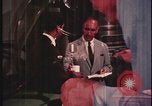 Image of detective gather crime evidence United States USA, 1970, second 24 stock footage video 65675078755