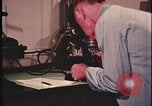 Image of detective gather crime evidence United States USA, 1970, second 25 stock footage video 65675078755