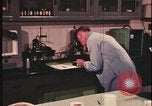Image of detective gather crime evidence United States USA, 1970, second 27 stock footage video 65675078755