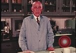 Image of detective gather crime evidence United States USA, 1970, second 35 stock footage video 65675078755