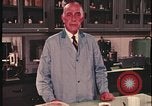 Image of detective gather crime evidence United States USA, 1970, second 36 stock footage video 65675078755