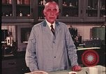 Image of detective gather crime evidence United States USA, 1970, second 37 stock footage video 65675078755