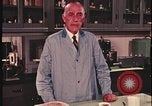 Image of detective gather crime evidence United States USA, 1970, second 39 stock footage video 65675078755