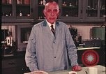 Image of detective gather crime evidence United States USA, 1970, second 40 stock footage video 65675078755