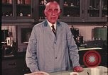Image of detective gather crime evidence United States USA, 1970, second 41 stock footage video 65675078755