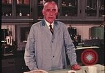 Image of detective gather crime evidence United States USA, 1970, second 43 stock footage video 65675078755