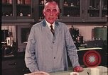 Image of detective gather crime evidence United States USA, 1970, second 50 stock footage video 65675078755