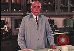 Image of detective gather crime evidence United States USA, 1970, second 52 stock footage video 65675078755