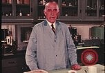 Image of detective gather crime evidence United States USA, 1970, second 54 stock footage video 65675078755