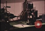 Image of detective gather crime evidence United States USA, 1970, second 57 stock footage video 65675078755