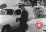 Image of car dealer alerts FBI stolen automobile Maryland United States USA, 1956, second 1 stock footage video 65675078757