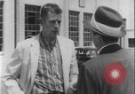 Image of car dealer alerts FBI stolen automobile Maryland United States USA, 1956, second 12 stock footage video 65675078757