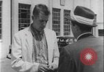 Image of car dealer alerts FBI stolen automobile Maryland United States USA, 1956, second 15 stock footage video 65675078757