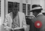 Image of car dealer alerts FBI stolen automobile Maryland United States USA, 1956, second 23 stock footage video 65675078757