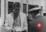 Image of car dealer alerts FBI stolen automobile Maryland United States USA, 1956, second 26 stock footage video 65675078757